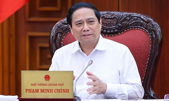 Thủ tướng Phạm Minh Chính chủ trì cuộc họp thúc đẩy phát triển nhà ở xã hội chiều tối ngày 17/5. Ảnh: VGP