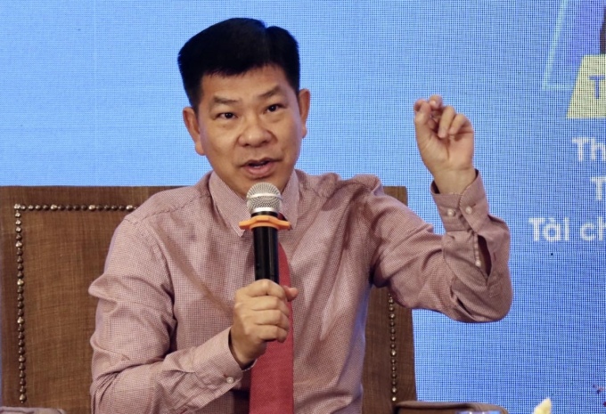 Ông Lê Hữu Nghĩa, Tổng giám đốc Công ty TNHH Xây dựng thương mại Lê Thành, phát biểu tại chương trình Cà phê doanh nhân, ngày 8/6. Ảnh: Bình Nghi