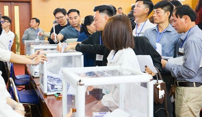 Nhà đầu tư tham gia đấu giá đất tại huyện Quốc Oai hôm 6/4. Ảnh: Cổng thông tin điện tử huyện Quốc Oai